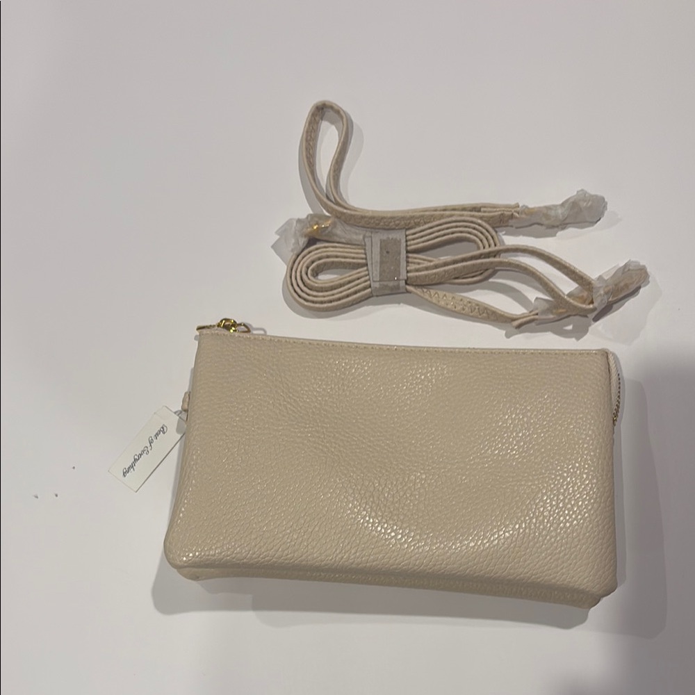 Best Of Everything Cream Wristlet Crossbody